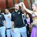Michigan kicker Brendan Gibbons is lead to the dance floor by a belly dancer at Busch Gardens in Tampa, Fla. on Saturday, Dec. 29. Melanie Maxwell I AnnArbor.com
